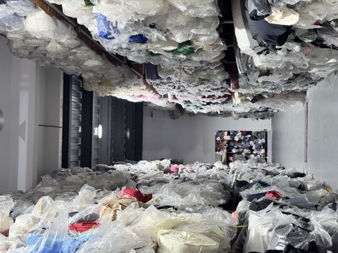 A full aisle inside our surplus-fabric warehouse